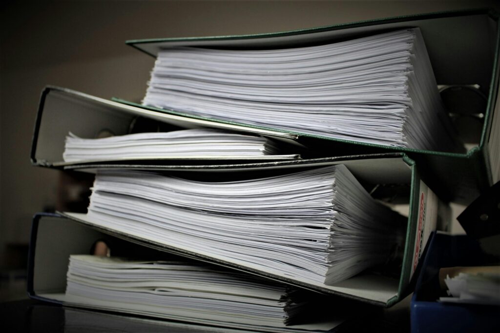 Binders stacked to choose a london accountant